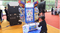 Os robôs transformam crianças internas Arcade Machine do divertimento